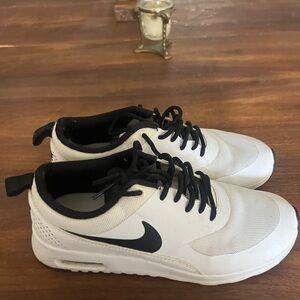 Nike Woman’s Black and White Athletic Sneakers